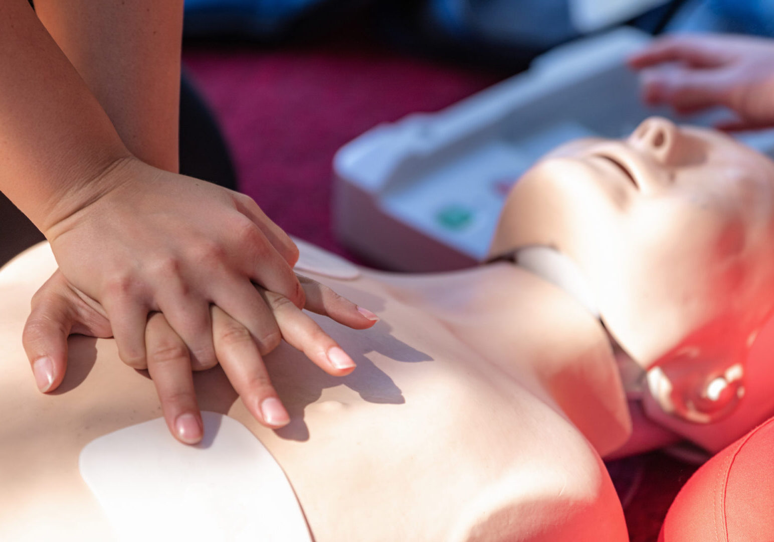Cardiopulmonary Resuscitation, First Aid Training on a CPR Dummy.